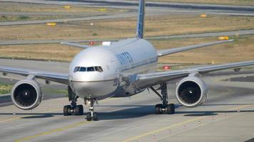 FRANKFURT AM MAIN, GERMANY JULY 19, 2017 - United Airlines Boeing 777 taxiing after landing on runway 25R. Fraport, Frankfurt, Germany video