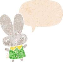 cute cartoon tiny rabbit and speech bubble in retro textured style vector