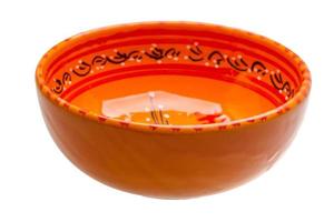 Red bowl on white background photo