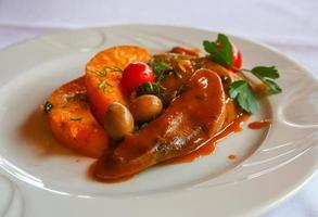 Beef tongue on the plate photo