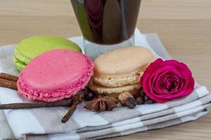 Macaroons delicious on wooden background photo