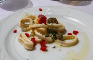 Squid rings on the plate photo