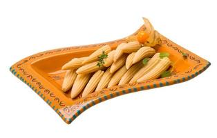 Baby corn on the plate and white background photo