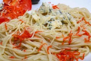 Cheese pasta on the plate photo