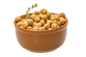 Chickpea in a bowl on white background photo