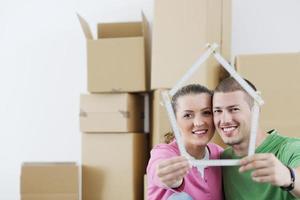 Young couple moving in new house photo