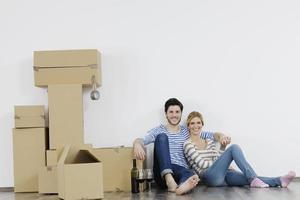 Young couple moving in new home photo