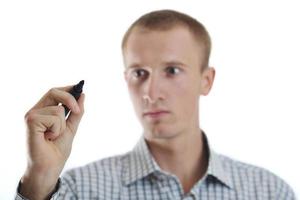 handsome young business man touching screen isolated photo