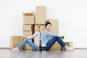 Young couple moving in new house photo