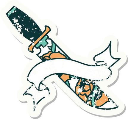worn old sticker with banner of a dagger and flowers