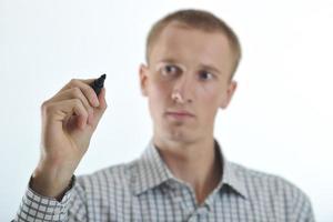 handsome young business man touching screen isolated photo