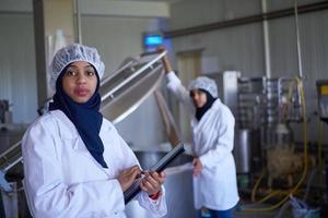 business woman team in local  cheese production company photo