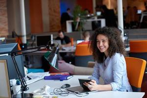 young  business woman at office photo