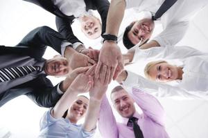 business people group joining hands photo