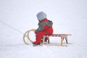 sledding on snow photo