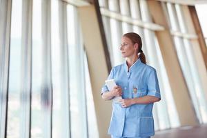 female doctor with tablet computer photo