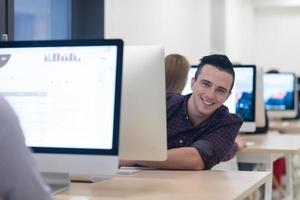startup business, software developer working on desktop computer photo