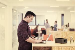 startup business, young  man portrait at modern office photo