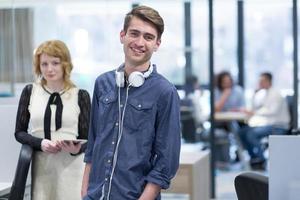 Business People Working With Tablet in startup office photo