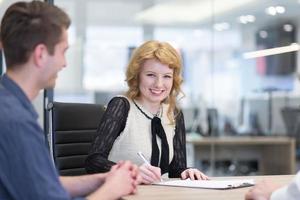 Startup Business Team At A Meeting at modern office building photo