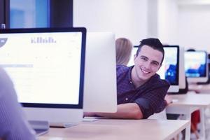 startup business, software developer working on desktop computer photo
