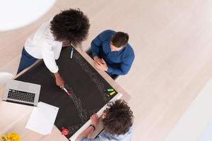 top view of Multiethnic startup business team on meeting photo