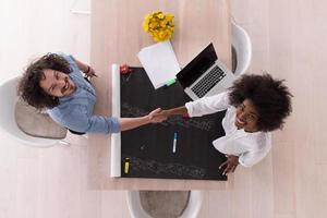 top view of Multiethnic startup business team on meeting photo