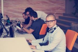 startup business, software developer working on computer photo
