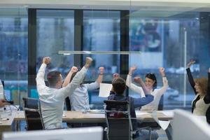 startup Group of young business people throwing documents photo