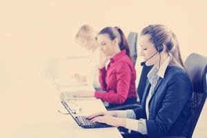 business woman group with headphones photo