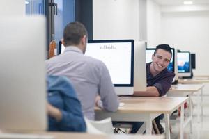 startup business, software developer working on desktop computer photo