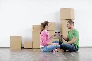 Young couple moving in new house photo