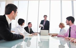 group of business people at meeting photo