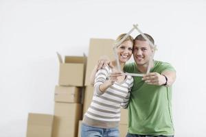 Young couple moving in new home photo