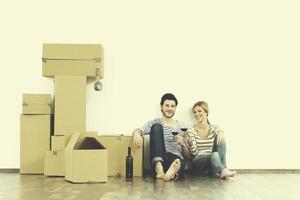 Young couple moving in new home photo