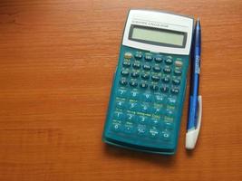 Calculator on table photo