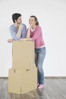 Young couple moving in new home photo