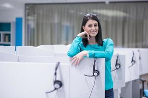 female call centre operator doing her job photo