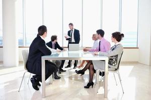 group of business people at meeting photo