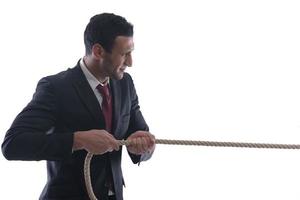 business man with rope isolated on white background photo