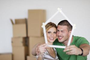 Young couple moving in new house photo