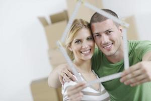 Young couple moving in new home photo