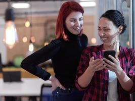 female friends discussion about project at moder coworking office photo