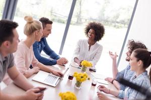 Multiethnic startup business team on meeting photo