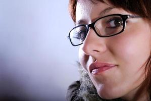 Portrai of a young woman wearing glasses photo