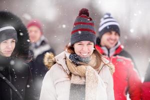 Portrait of young woman on snowy winter day photo