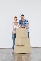 Young couple moving in new home photo