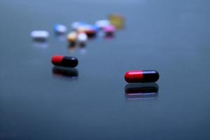 pills on glosy surface photo