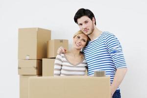 Young couple moving in new house photo