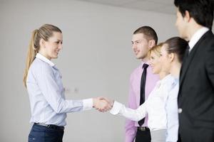 Group of young business people at meeting photo